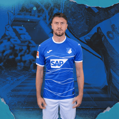 A Man Is Wearing A Blue Shirt With The Word Sap On It GIF