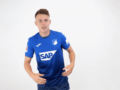 A Man Is Wearing A Blue Shirt With The Word Sap On It GIF