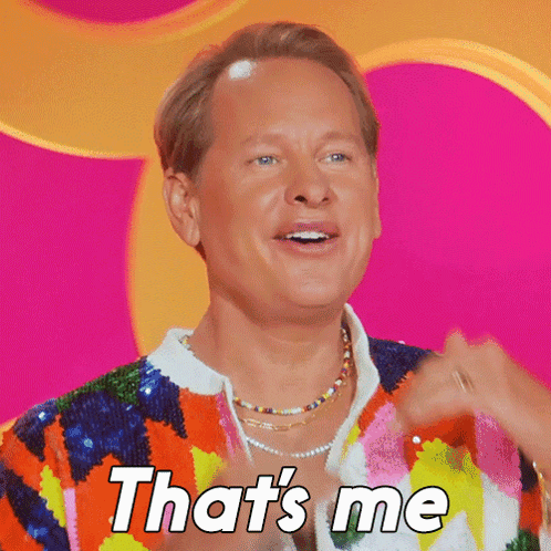 A Man Is Wearing A Colorful Sweater And Necklace And Says That 'S Me GIF