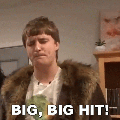 A Man Is Wearing A Fur Coat And Says Big Big Hit GIF