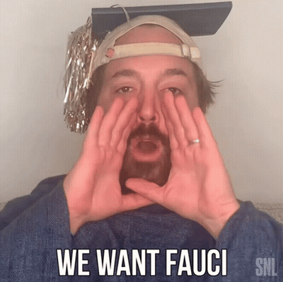A Man Is Wearing A Graduation Cap And Making A Funny Face With The Words We Want Fauci Below Him GIF