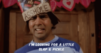 A Man Is Wearing A Hat That Says Asshole On It GIF