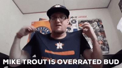 A Man Is Wearing A Houston Astros Shirt And A Hat And Says Mike Trout Is Overrated Bud GIF