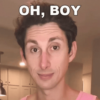 A Man Is Wearing A Pink Tank Top And Has The Words Oh Boy On His Face GIF