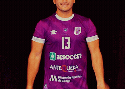 A Man Is Wearing A Purple Jersey With The Number 13 On It GIF