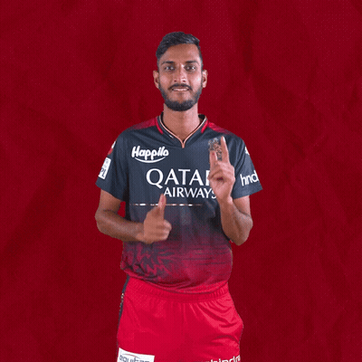 A Man Is Wearing A Qatar Airways Shirt And Giving A Thumbs Up GIF