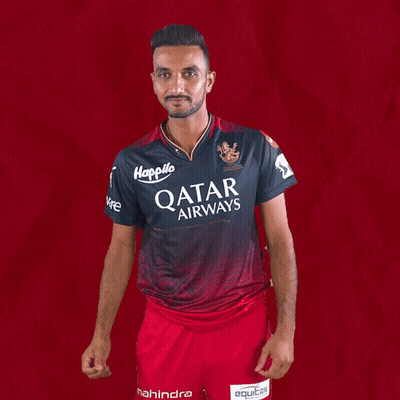 A Man Is Wearing A Qatar Airways Shirt GIF