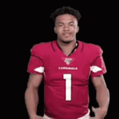 A Man Is Wearing A Red Cardinals Jersey And Dancing . GIF