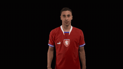 A Man Is Wearing A Red Puma Shirt GIF