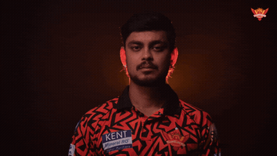 A Man Is Wearing A Shirt That Says Kent Mineral Ro GIF