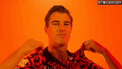 A Man Is Wearing A Shirt That Says ' Kuhl ' On It GIF