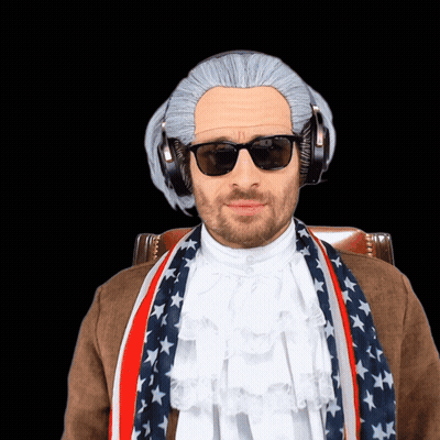 A Man Is Wearing A Wig And Sunglasses And Has A Scarf Around His Neck GIF