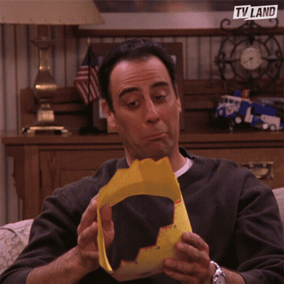 A Man Is Wearing A Yellow Crown And The Tv Land Logo Is Visible GIF