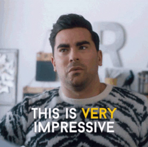 A Man Is Wearing A Zebra Print Sweater And Says This Is Very Impressive GIF