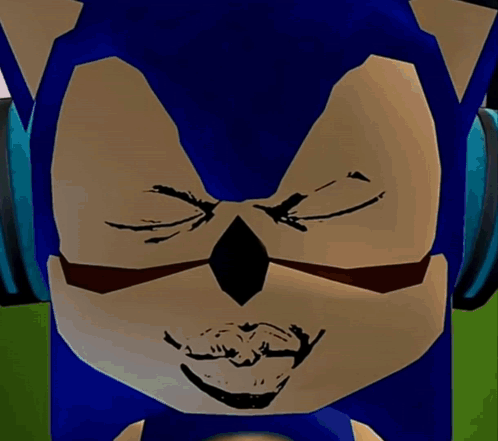 A Man Is Wearing Headphones And Making A Funny Face . GIF