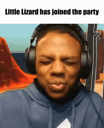A Man Is Wearing Headphones And Making A Funny Face With The Caption Little Lizard Has Joined The Party GIF