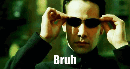 A Man Is Wearing Sunglasses And The Word Bruh Is On The Screen . GIF