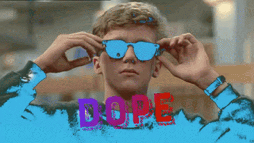 A Man Is Wearing Sunglasses And The Word Dope Is Behind Him GIF
