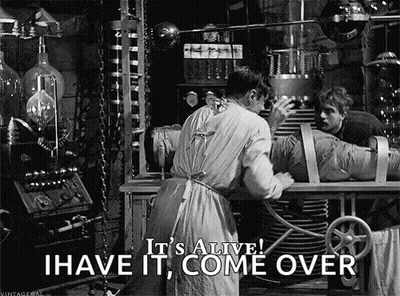 A Man Is Working On A Mummy In A Laboratory And Says `` It 'S Alive ! I Have It Come Over '' GIF