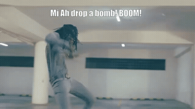 A Man Jumps In The Air With The Words Mi Ah Drop A Bomb Boom GIF