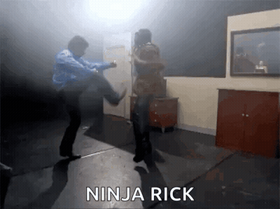A Man Kicking Another Man In The Face With The Words Ninja Rick Written Below Him GIF