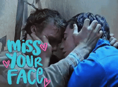 A Man Kissing Another Man With The Words Miss Your Face On The Bottom GIF