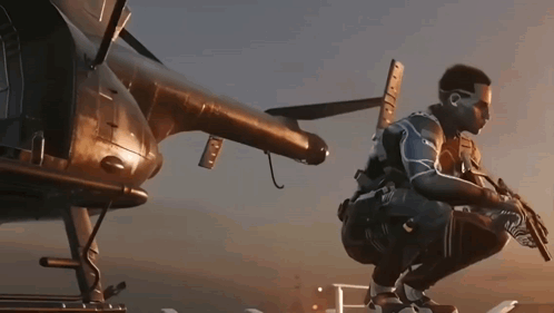 A Man Kneeling Down With A Gun In Front Of A Plane GIF