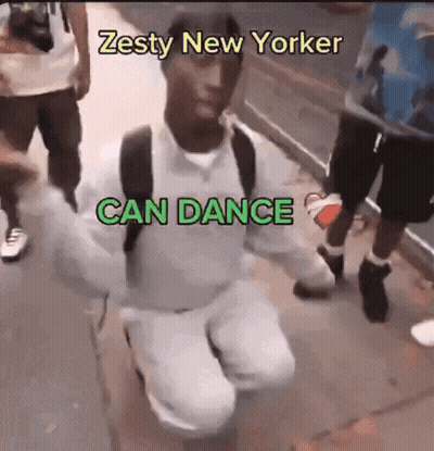 A Man Kneeling Down With The Words Zesty New Yorker Can Dance Written Above Him GIF