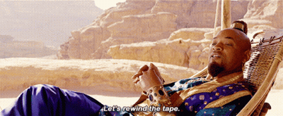 A Man Laying In A Hammock With The Words Let 'S Rewind The Tape Below Him GIF
