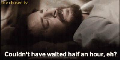 A Man Laying In Bed With The Words " Could N't Have Waited Half An Hour Eh " On The Bottom GIF