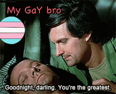 A Man Laying Next To Another Man With The Words " My Gay Bro " On The Bottom GIF