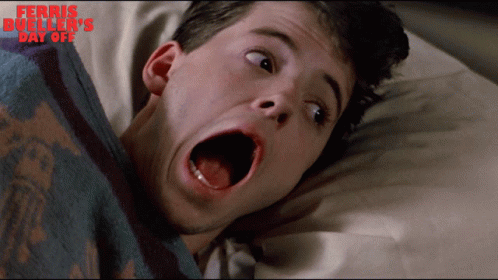 A Man Laying On A Bed With His Mouth Open And The Words " Ferris Bueller 'S Day Off " On The Bottom GIF