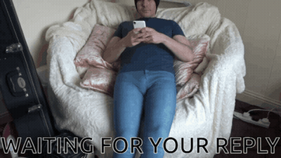 A Man Laying On A Couch With The Words Waiting For Your Reply Below Him GIF