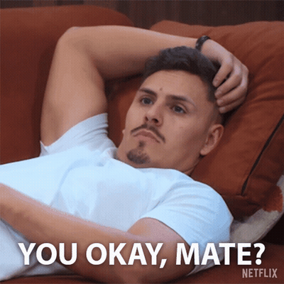 A Man Laying On A Couch With The Words " You Okay Mate " Written Below Him GIF