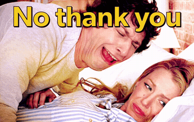 A Man Laying On A Woman 'S Stomach With The Words No Thank You Written Above Him GIF