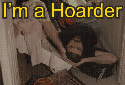A Man Laying On The Floor With The Caption I 'M A Hoarder GIF