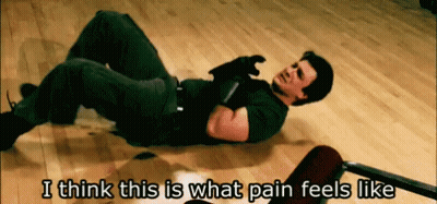 A Man Laying On The Floor With The Words " I Think This Is What Pain Feels Like " Below Him GIF