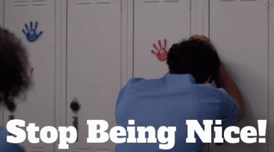 A Man Leaning Against A Locker With The Words " Stop Being Nice " On The Bottom GIF