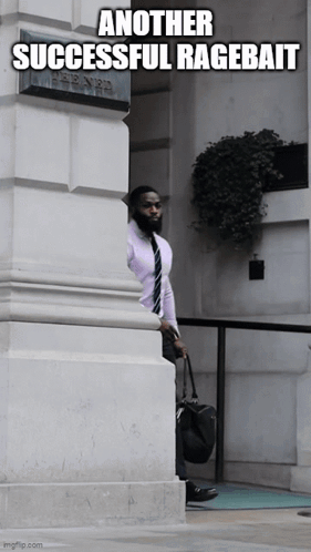 A Man Leaning Against A Wall With Another Successful Ragebait Written Below Him GIF