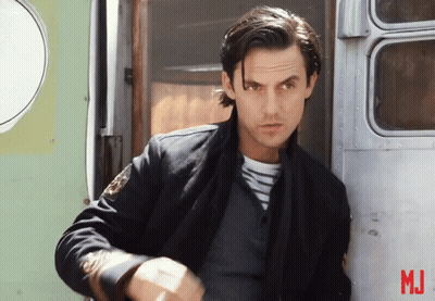 A Man Leaning Against A Wall With The Letters Mj On The Bottom GIF