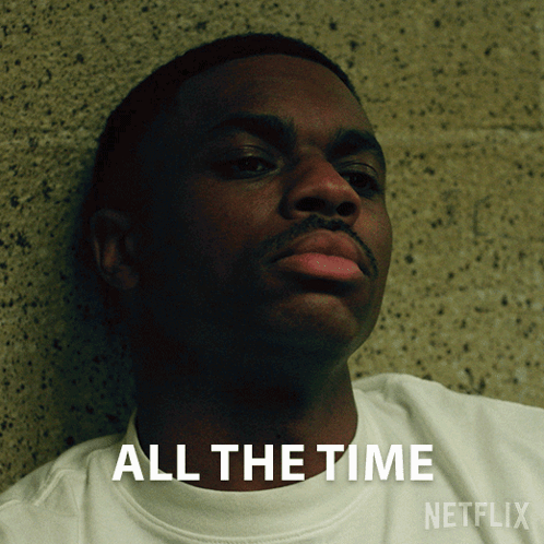 A Man Leaning Against A Wall With The Words All The Time Netflix GIF
