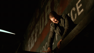 A Man Leaning Over A Railing With The Words " They Better Not Miss " Behind Him GIF