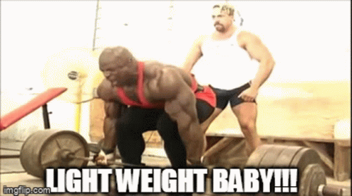 A Man Lifting A Barbell With The Words Light Weight Baby Written Below Him GIF