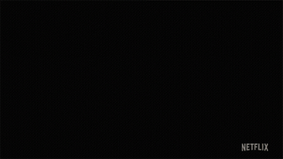 A Man Lighting A Match Next To Another Man With A Netflix Logo On The Bottom GIF