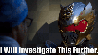 A Man Looking At A Helmet With The Words " I Will Investigate This Further " GIF