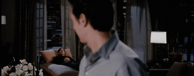 A Man Looking At A Woman Laying On A Couch With The Words " That Was Quite A Performance Today " GIF