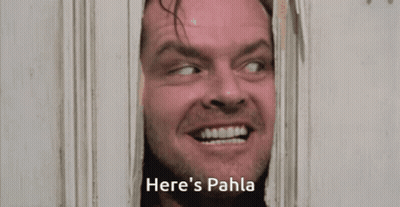 A Man Looking Through A Door With The Words Here 'S Pahla Written Below Him GIF