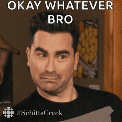 A Man Making A Face With The Words Okay Whatever Bro Behind Him GIF