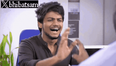 A Man Making A Funny Face In Front Of A Banner That Says X Bhibatsam GIF