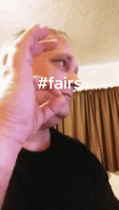 A Man Making A Funny Face With The Words #Fairs Written On It GIF
